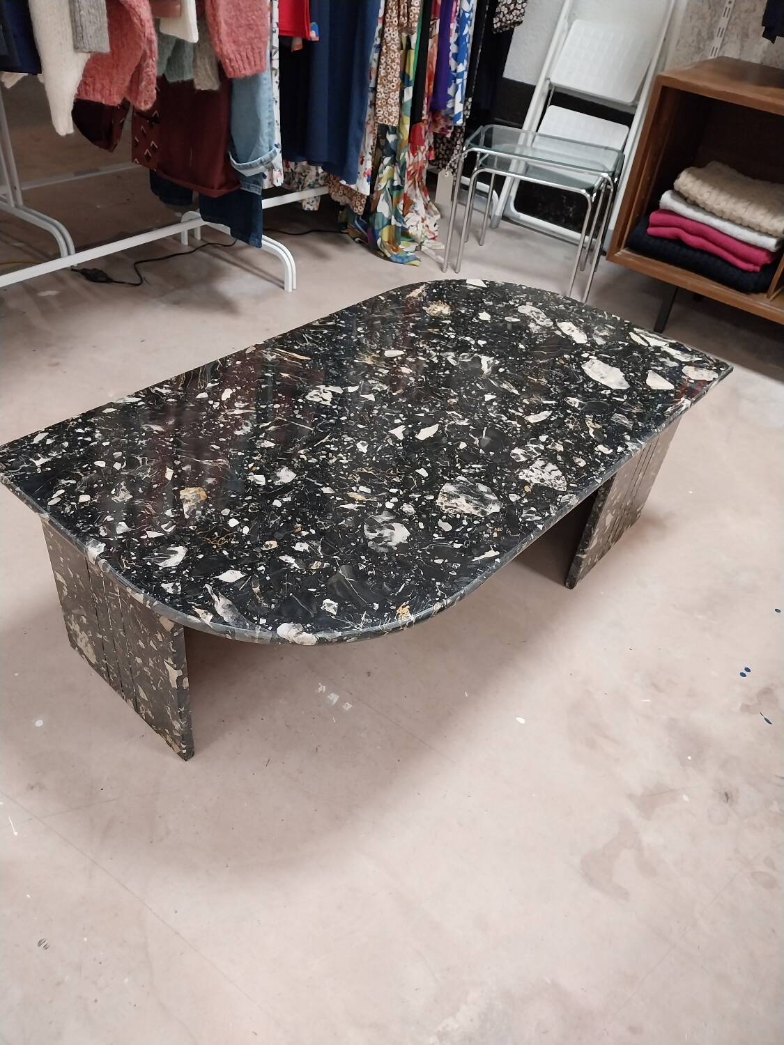 Black travertine eye coffee table