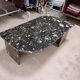 Black travertine eye coffee table
