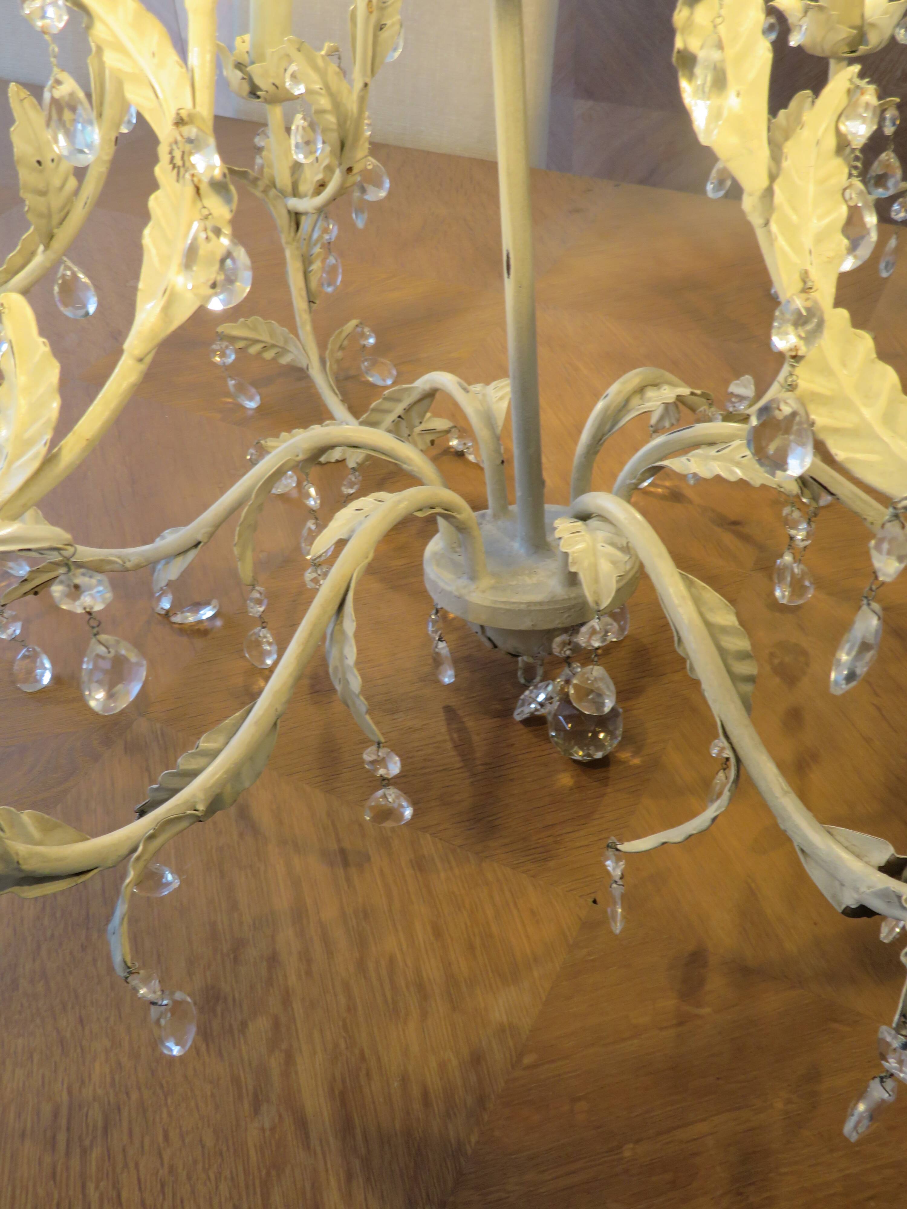 Large cage chandelier in aged metal.