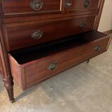 Louis XVI style commode with a shaped marble top.