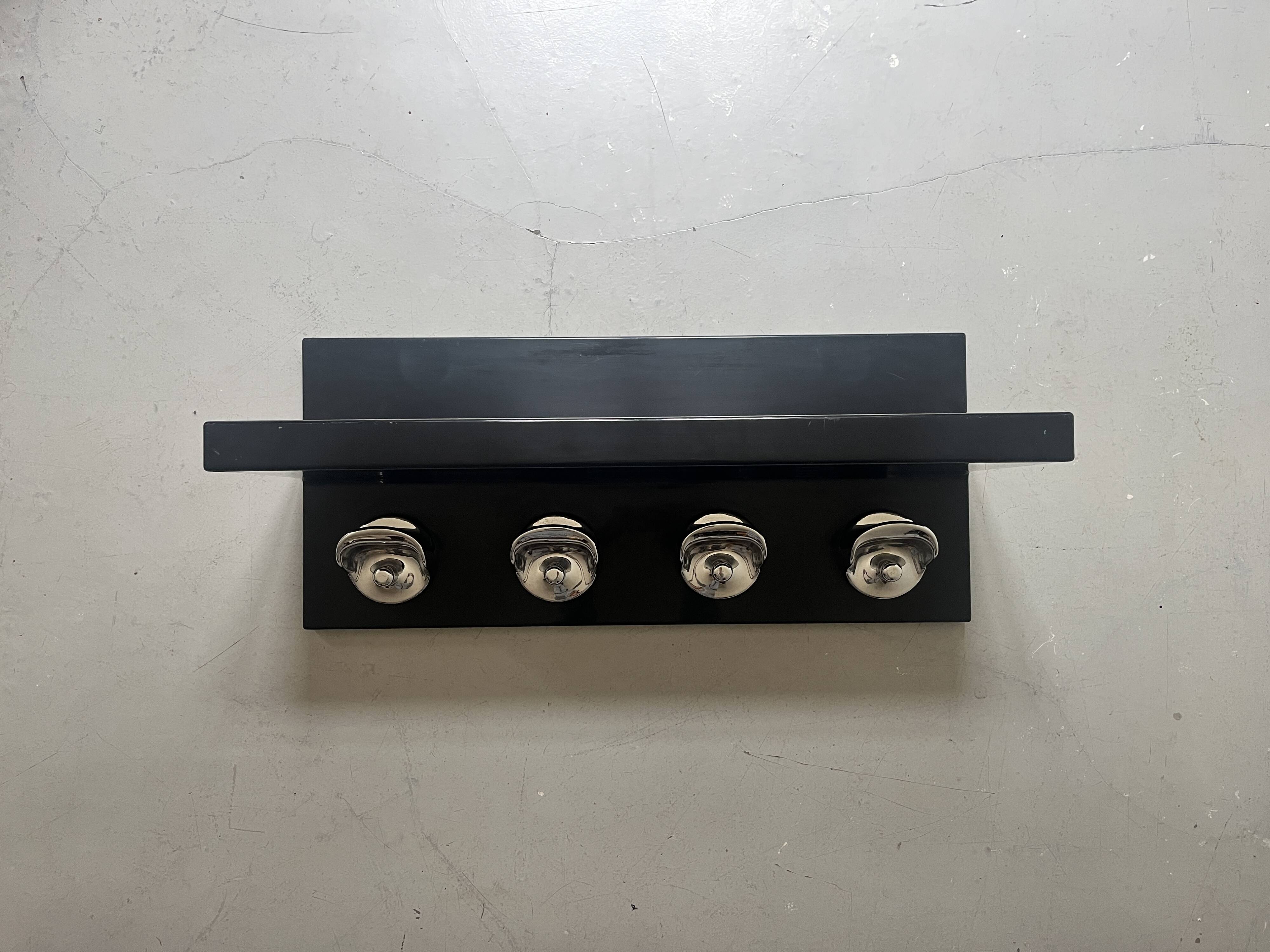 Large black magazine rack by Giotto Stoppino for Kartell, Italy 1970.