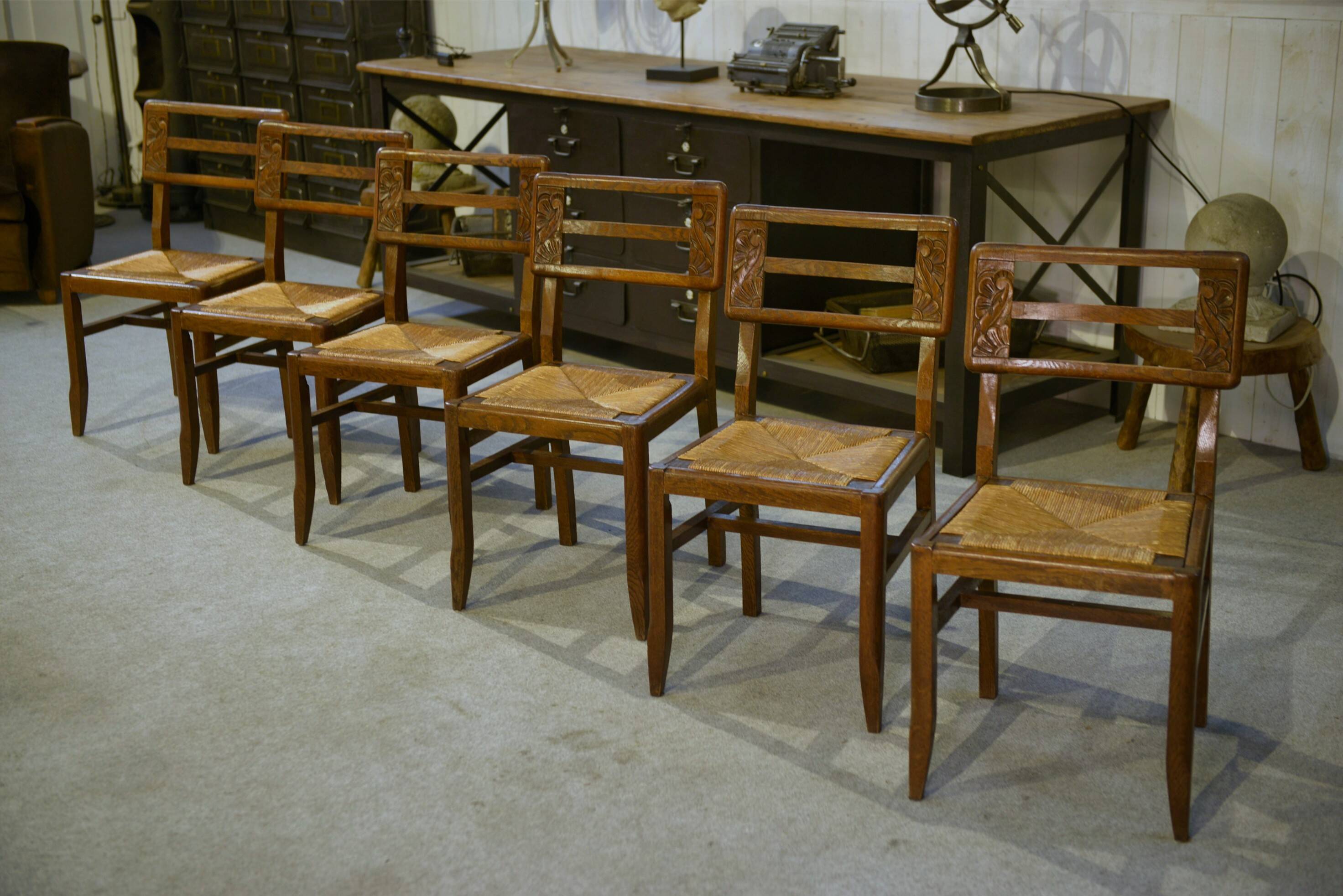 Set of 6 oak chairs in the style of Pierre Cruège 1940s.