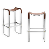 Brown and silver pair of stools without a backrest.