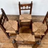 Series of 4 brutalist rustic chairs in carved wood straw seat