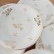 Dessert service, 10 plates and 1 pie dish, in Limoges Porcelain, white and gold