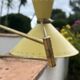 Diabolo wall lamp lunel yellow in the style of René Mathieu Guariche, star sheet metal.
