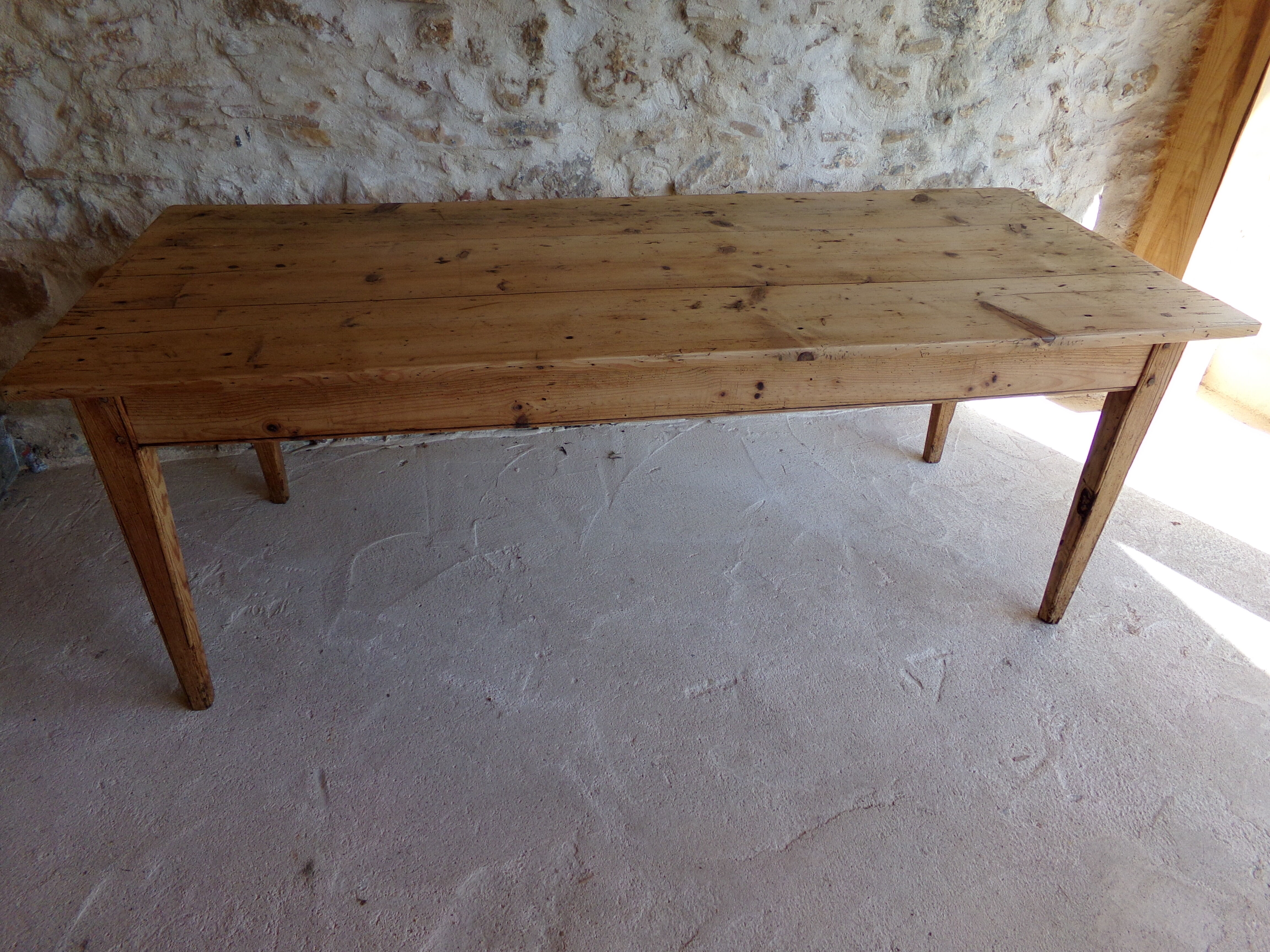 Farmhouse table in raw wood