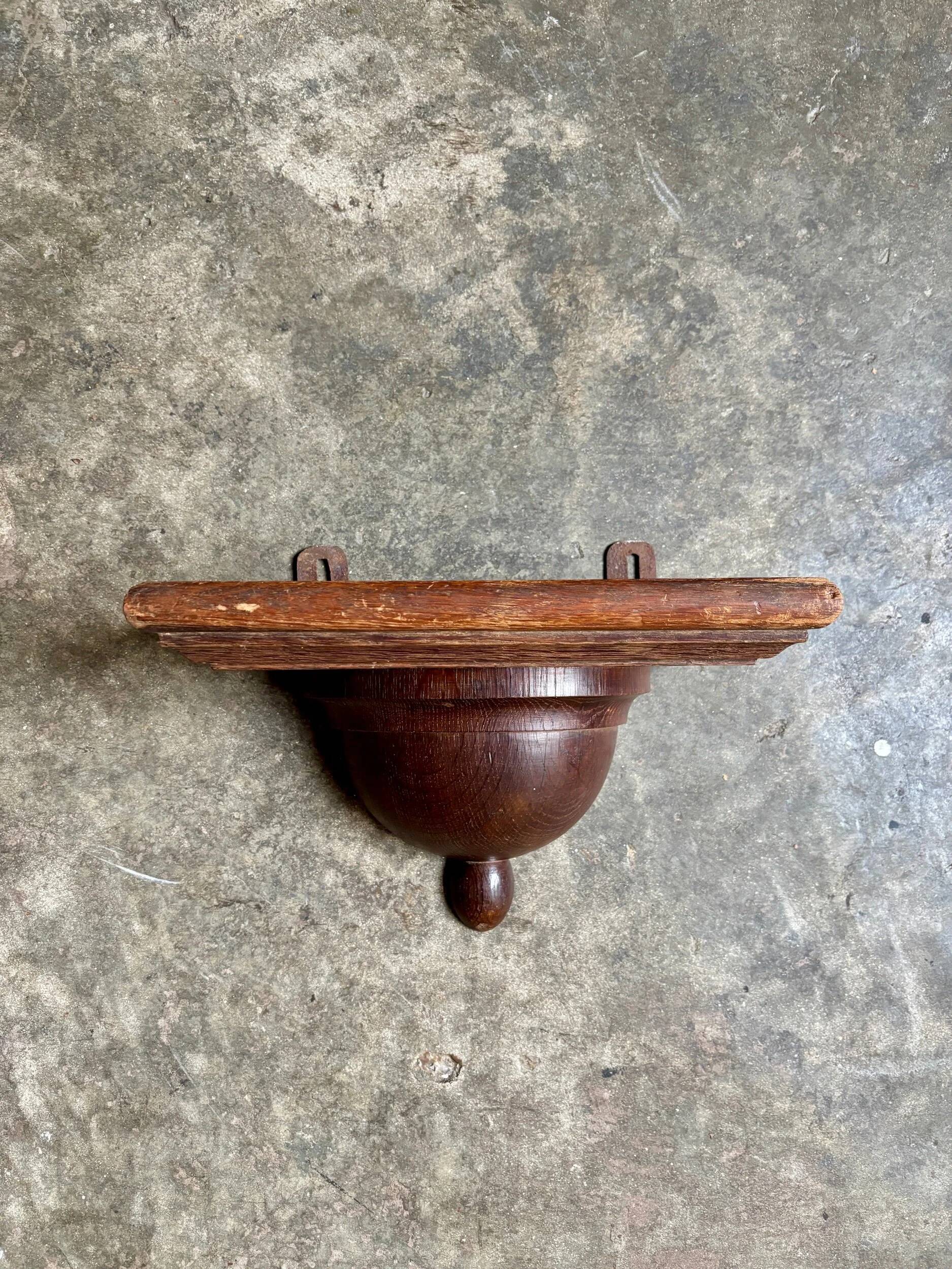 Dark wood wall shelf