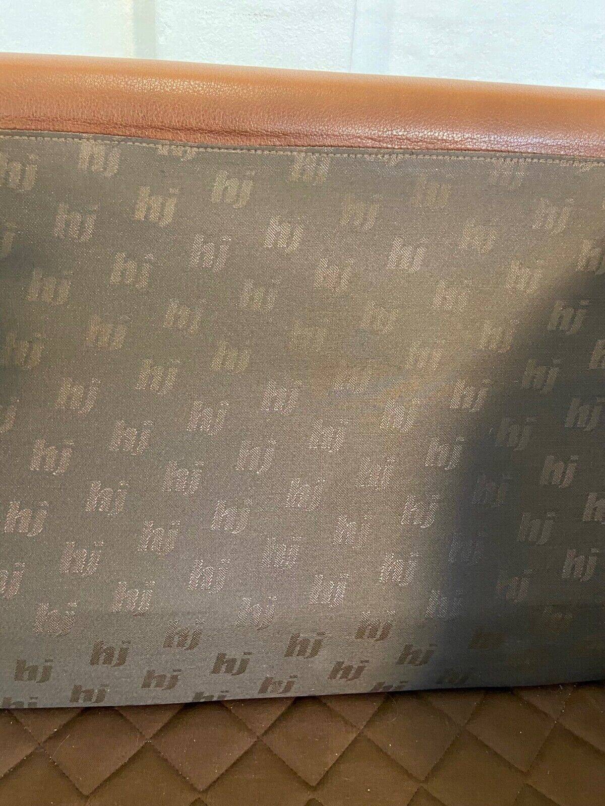 Fauteuil lounge scandinave vintage en cuir cognac, style milieu du siècle