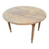 Round table with drop leaves and extensions - raw walnut