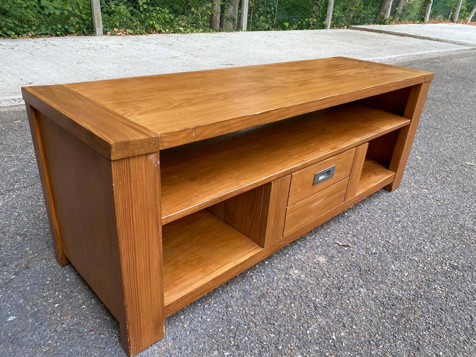 Solid pine wood TV unit stained with drawer and storage.