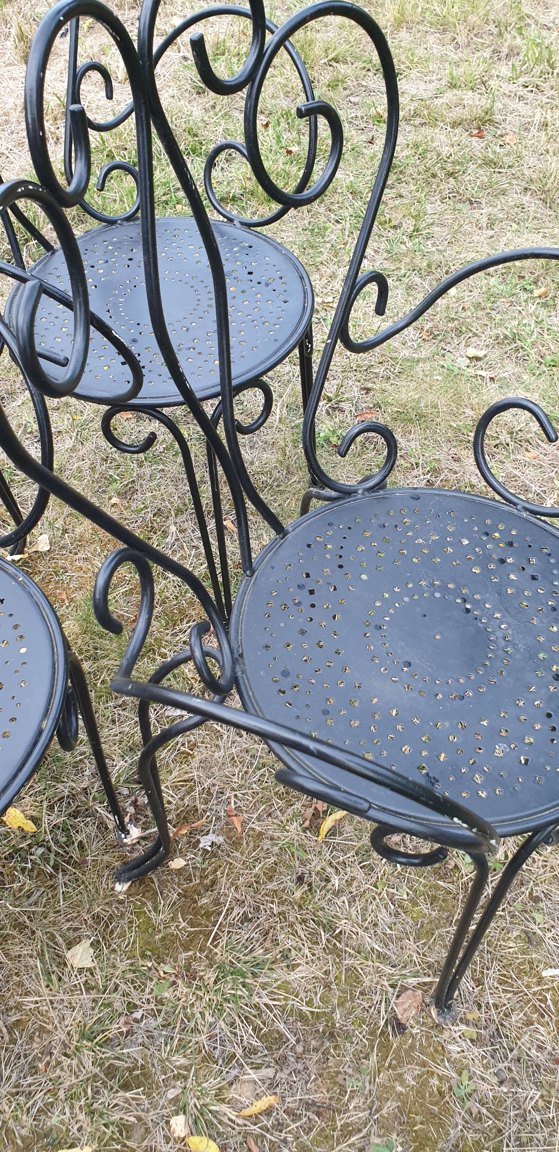 3 ornate wrought iron garden armchairs
