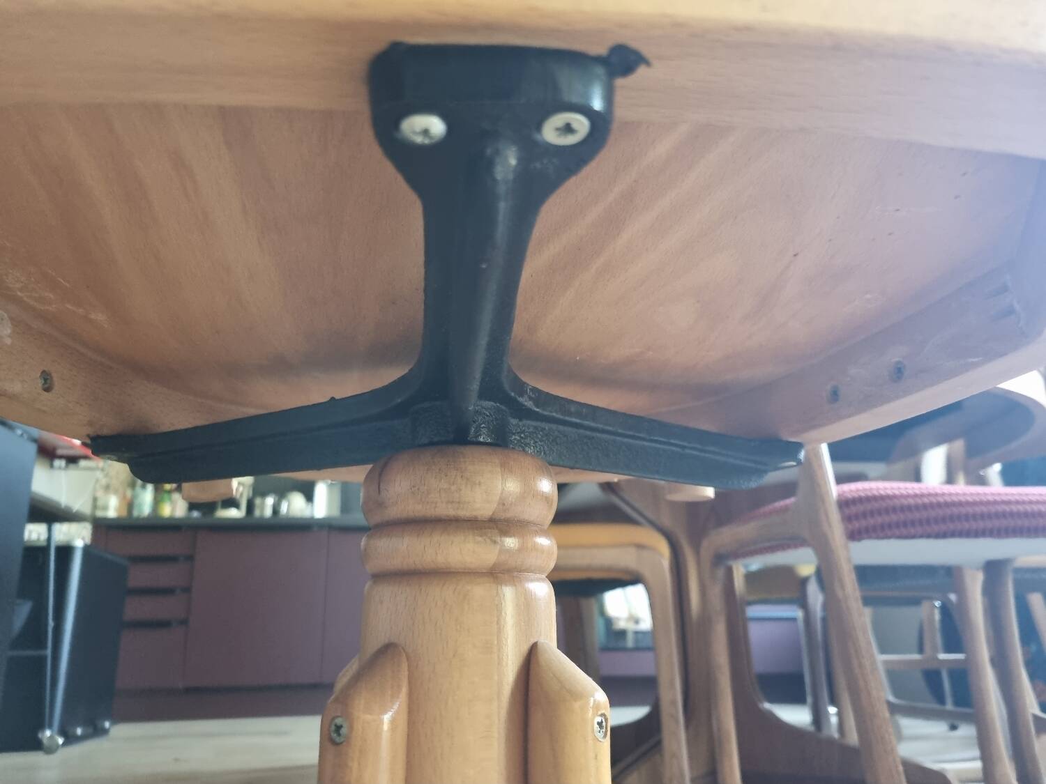 Wooden swivel armchair