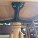 Wooden swivel armchair