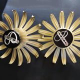 Golden metal flower sconces