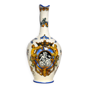 Gien earthenware jug, Renaissance decoration, putto with dolphin.