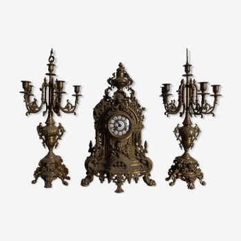 Brass pendulum and candlestick assembly