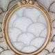 Oval photo frames in gilded wood with decoration, late 19th century