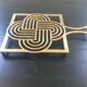 Dessous de plat graphique en laiton