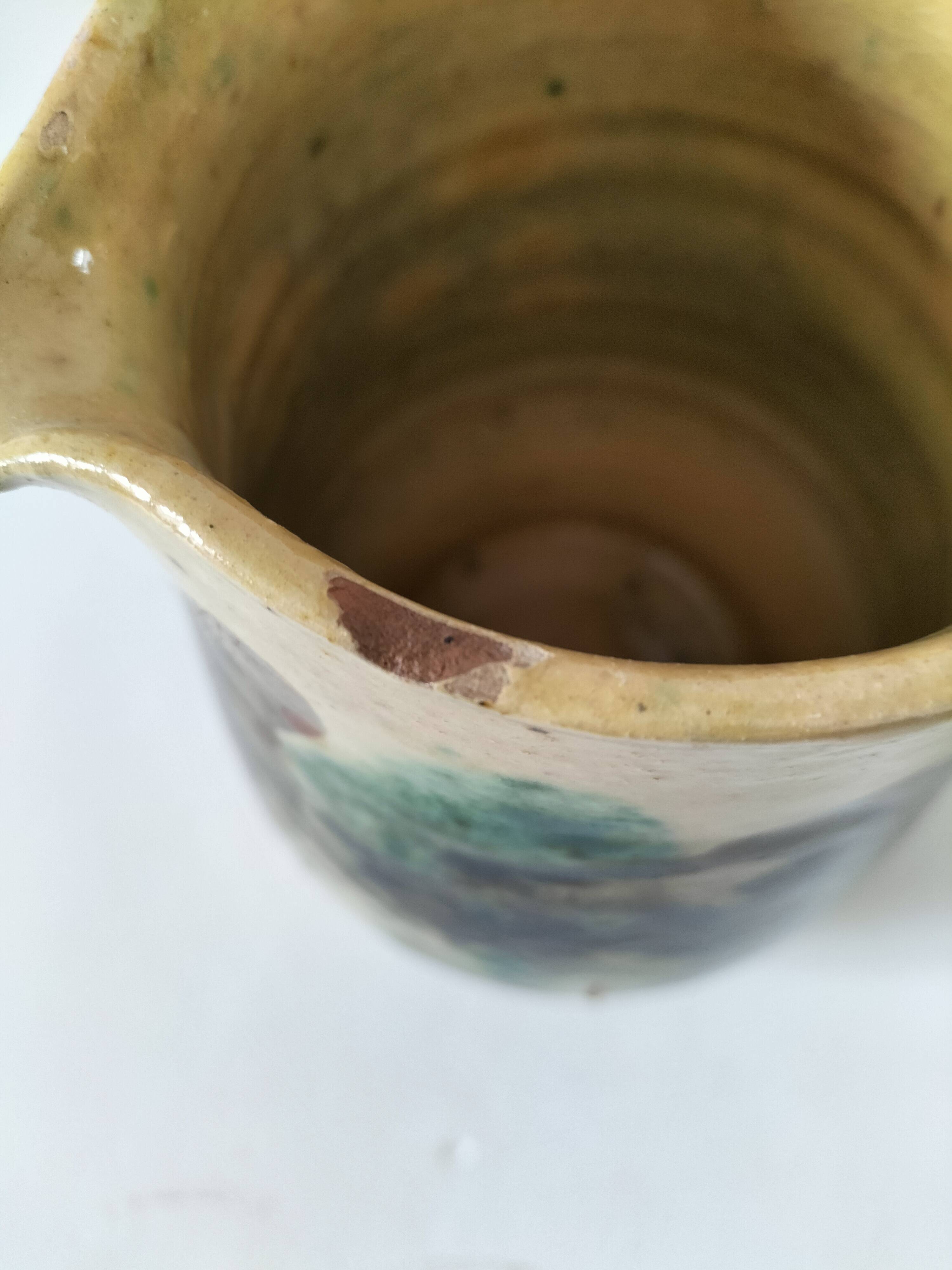 Glazed earthenware pitcher with abstract polychrome decoration, handmade.