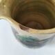Glazed earthenware pitcher with abstract polychrome decoration, handmade.