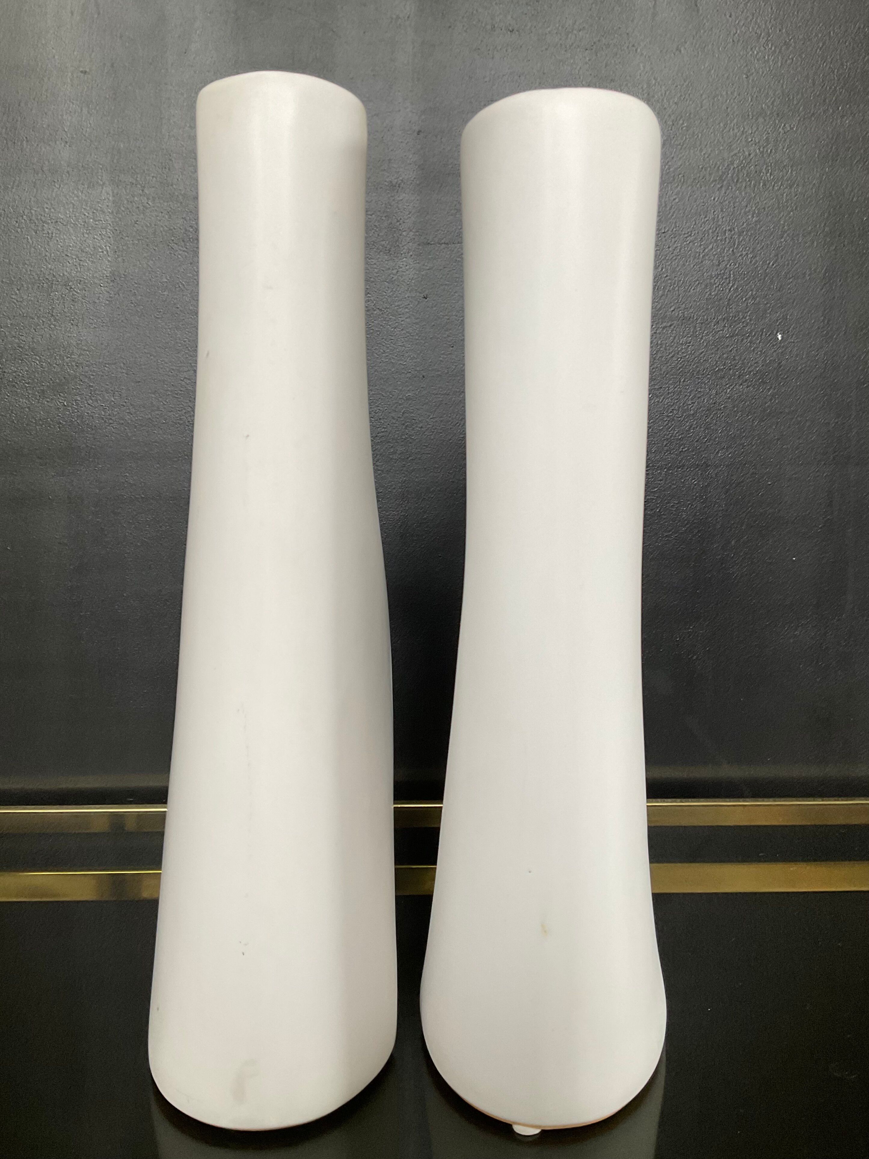 A pair of large designer ceramic vases.