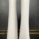 A pair of large designer ceramic vases.