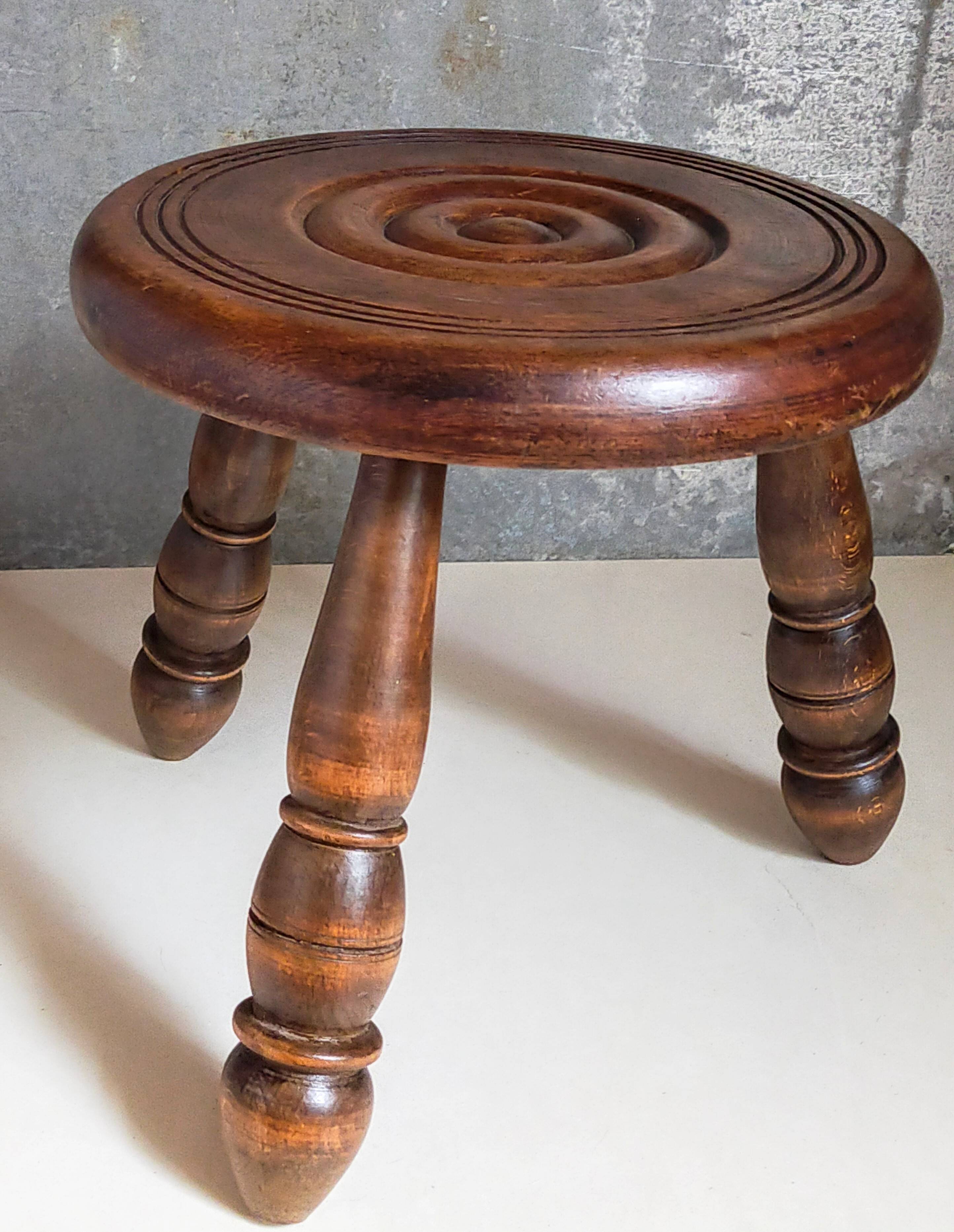 Low tripod stool in vintage turned solid wood