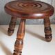 Low tripod stool in vintage turned solid wood