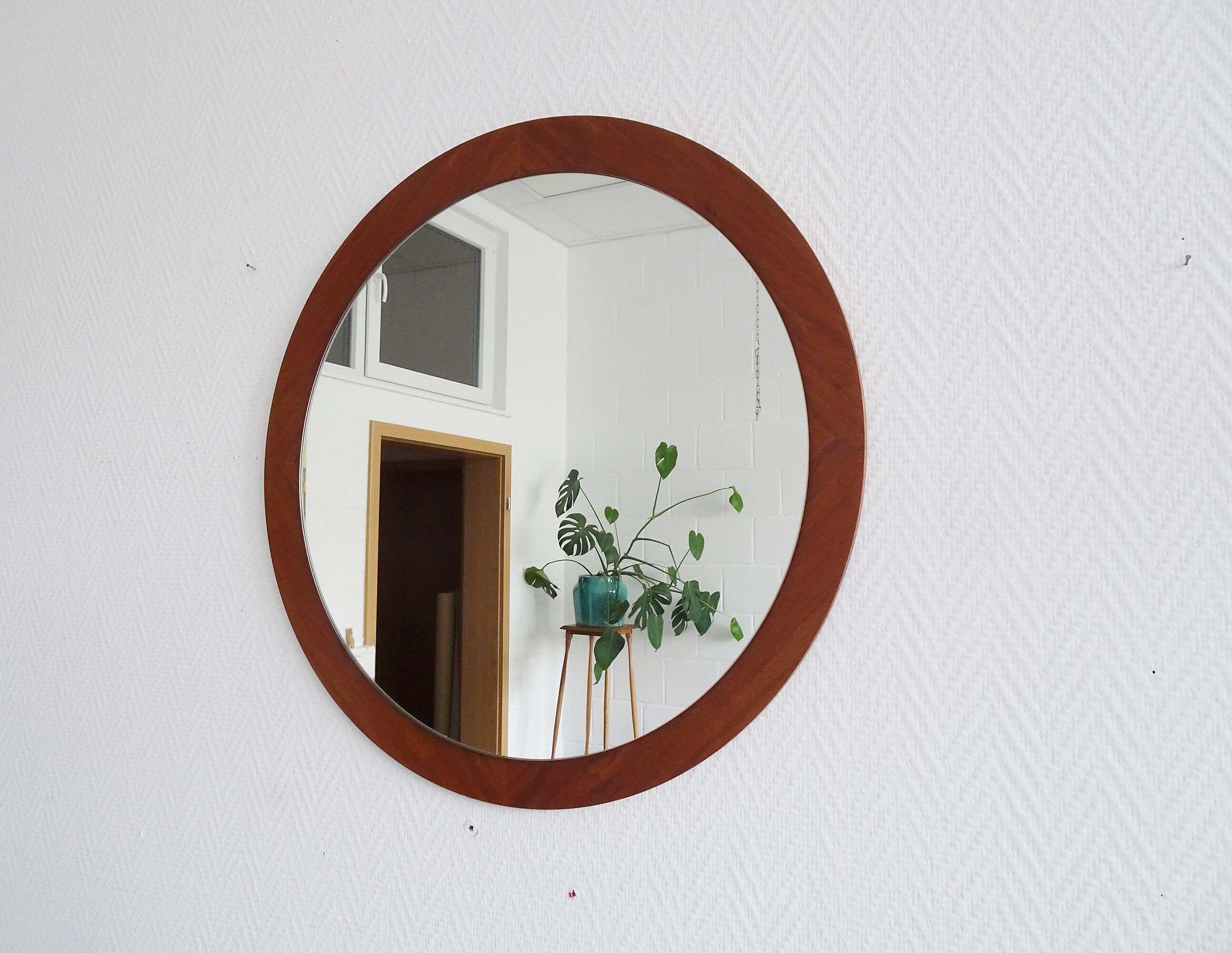round teak mirror