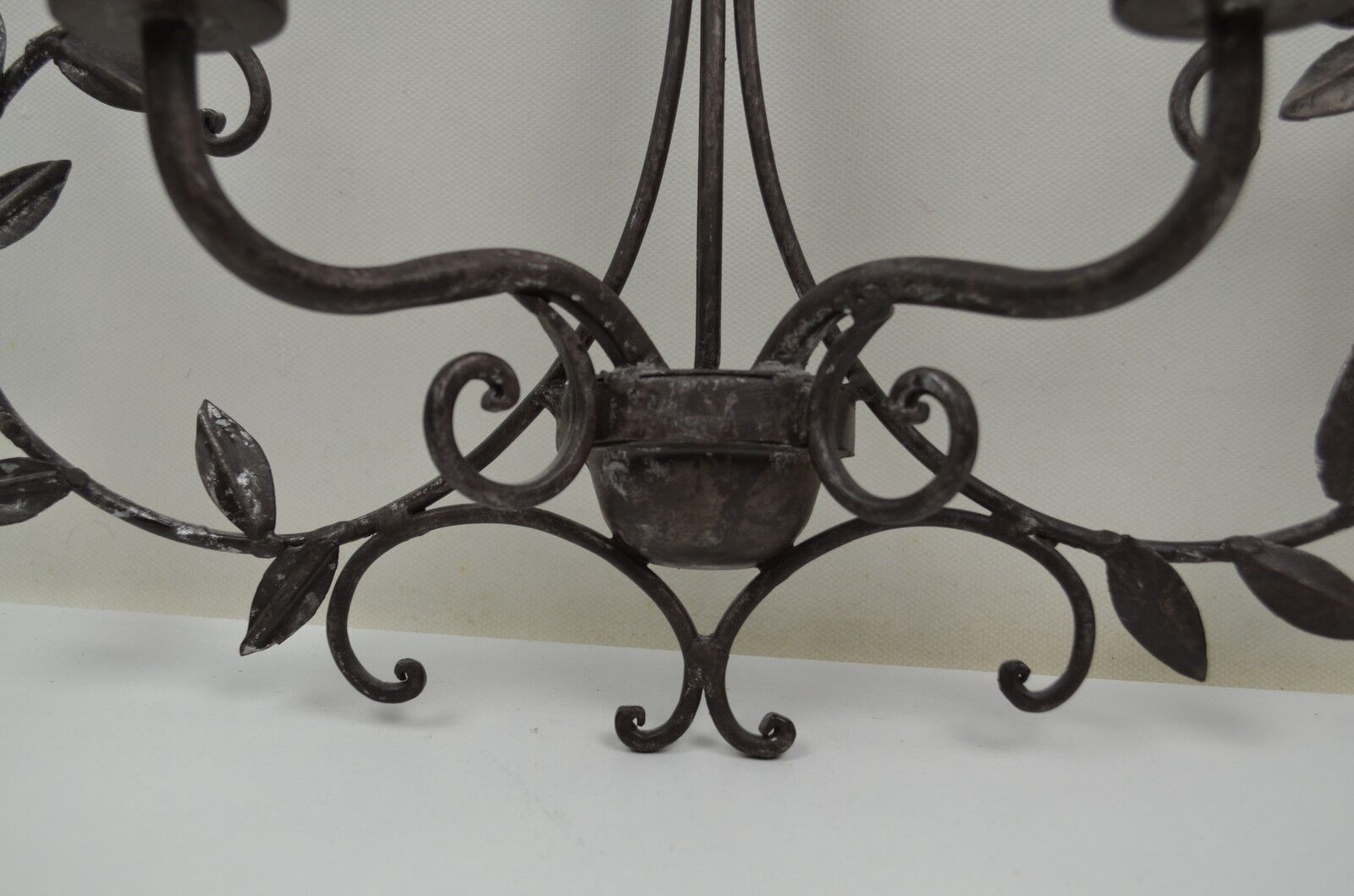 pair of grey patinated iron wall sconces