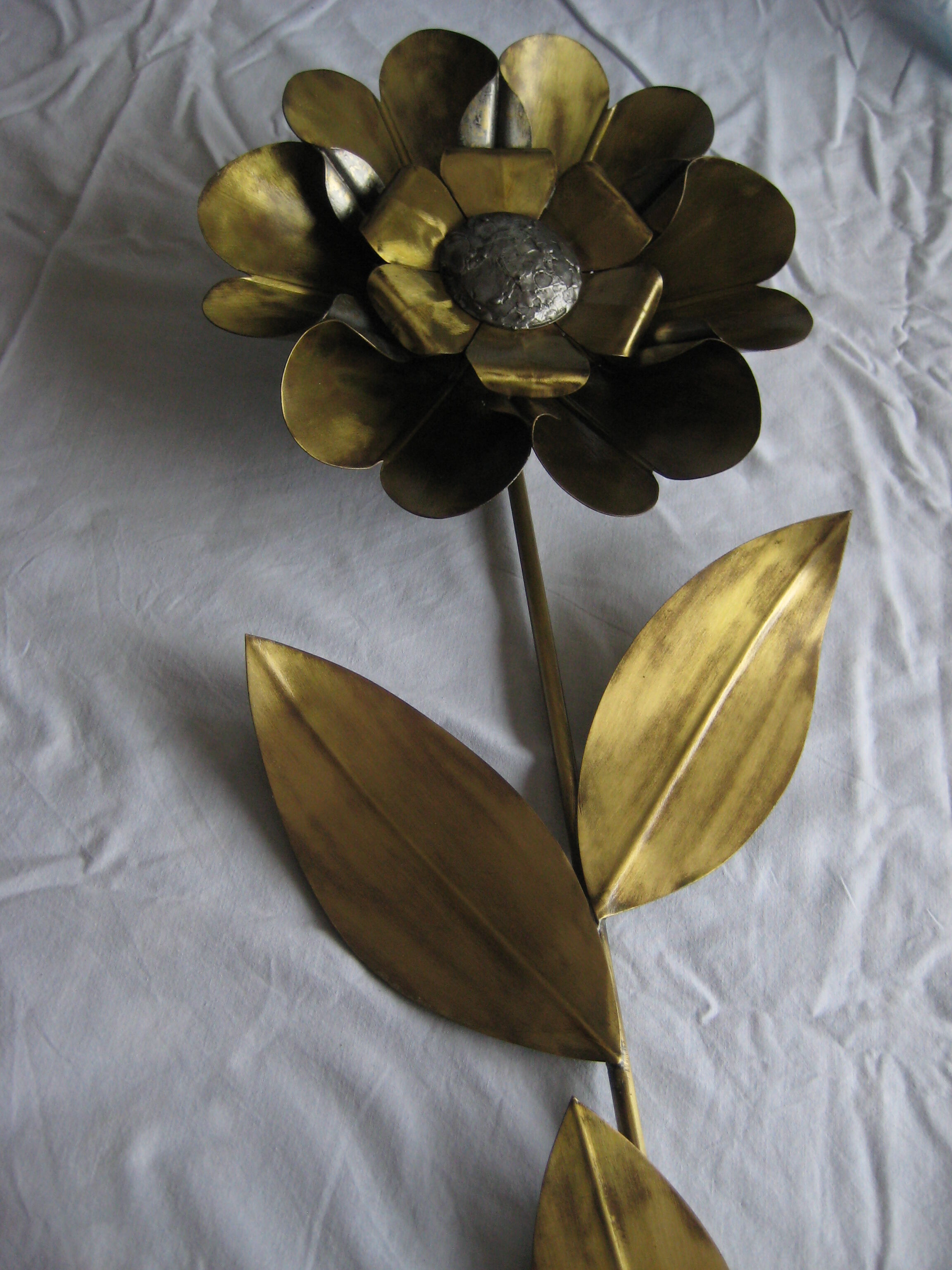 Brass sunflower sconces