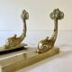 Brass wall supports for bathroom shelf, circa 1950.