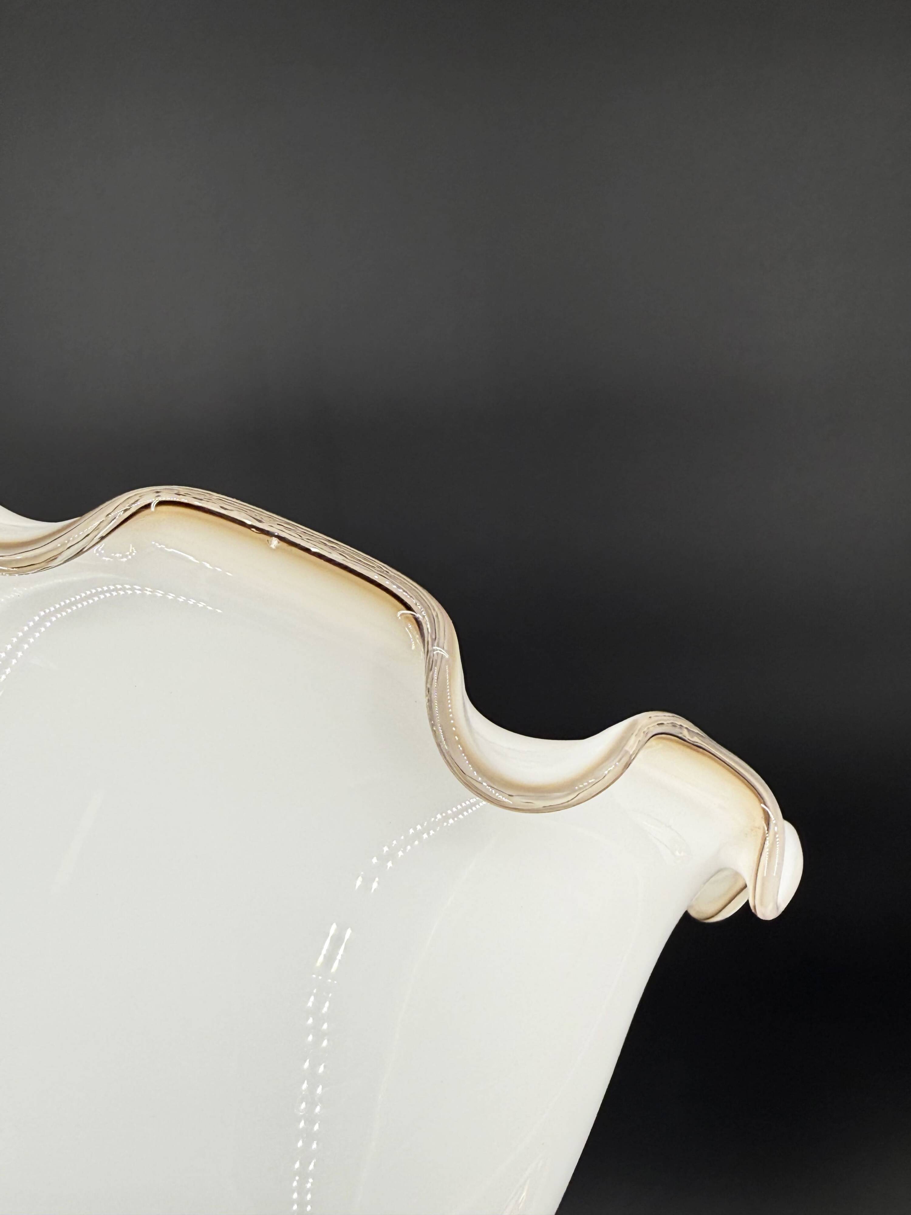 Set of 3 vintage bell-shaped pendants in white opaline with brown trim.