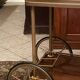 Servant table in gilded metal and mahogany mid-twentieth century