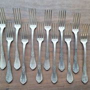 Set of silver metal forks