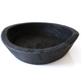 Cut / empty pocket in burning wood. shou-sugi-ban