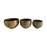 Trio of Art Deco brass pot covers
