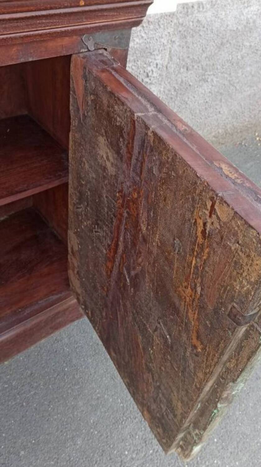 Long wooden sideboard with old green doors