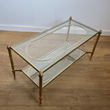 Rare bronze, brass, and steel mesh coffee table with a double glass top resting on a brass mesh. French work by Jansen