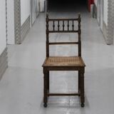 Pair of wooden caned chairs