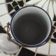 Enameled milk jug