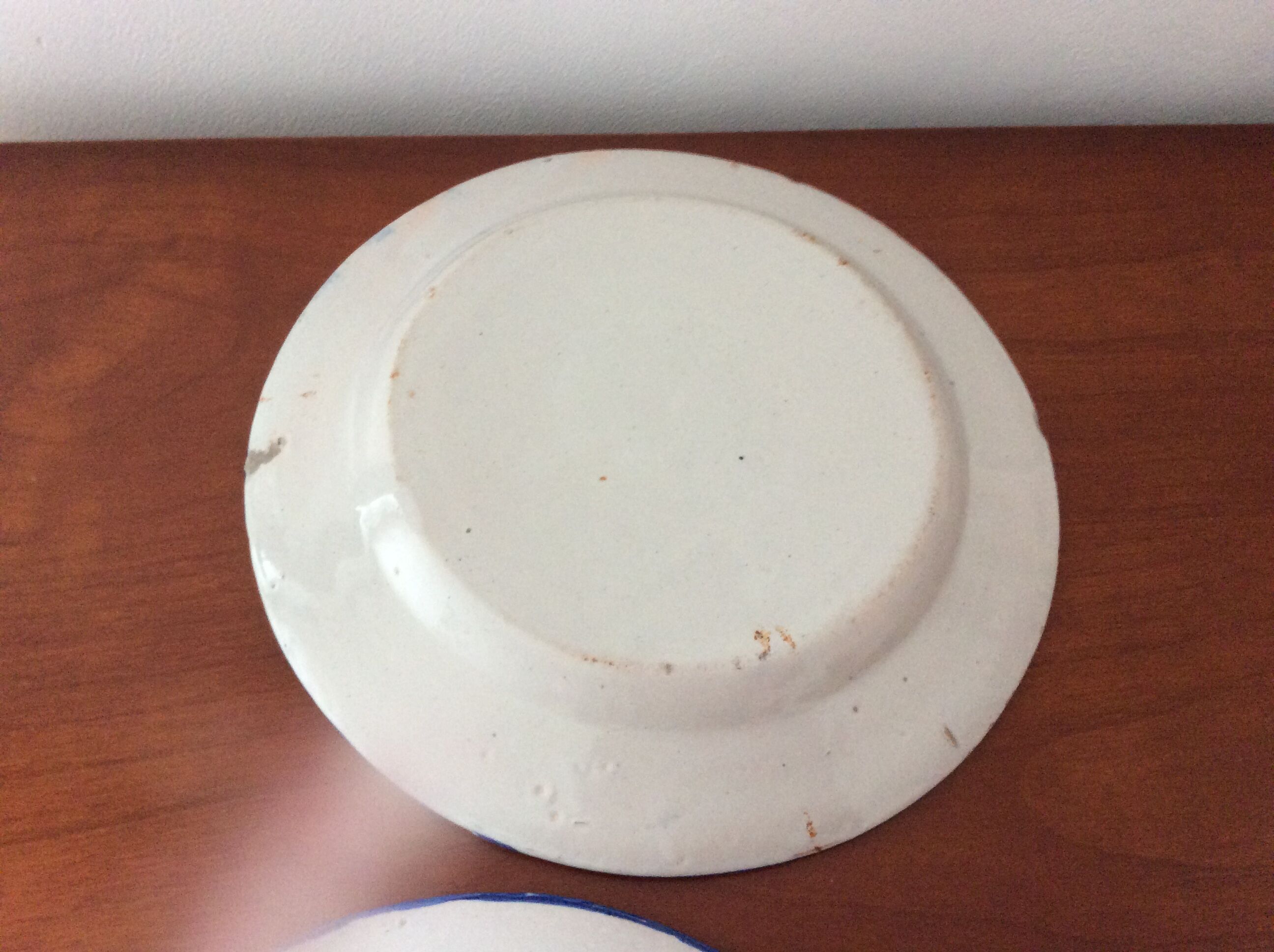 Set of 2 old painted terracotta plates enamelled