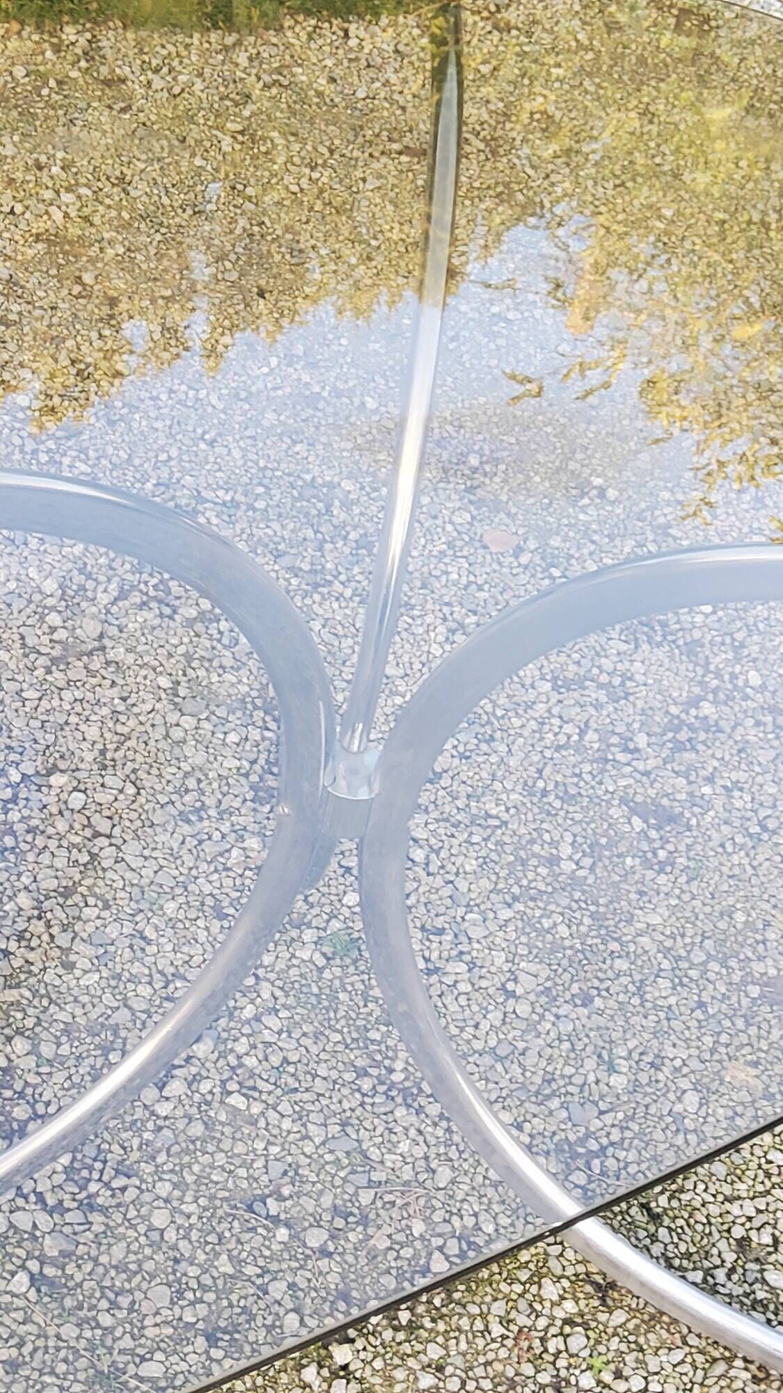 Designer table from the 70s, smoked glass top, chrome base