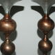 Pair of brutalist aluminum and copper candle holder