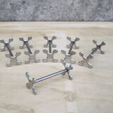 Six vintage metal knife holders