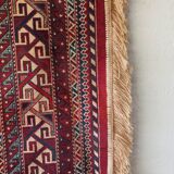 Wall rug with oriental patterns.