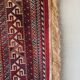 Tapis mural aux motifs orientaux.