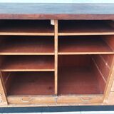 Workshop furniture with drawers and curtain in beech and walnut.