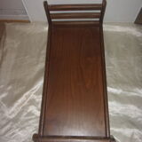 Old wooden doll bed